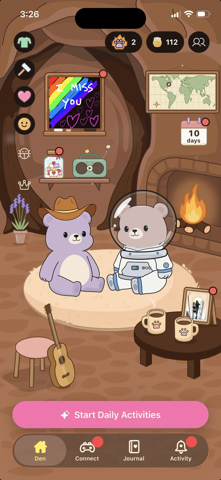 Den's home screen, where a purple bear in a cowboy hat and a bear in an astronaut suit sit together in their cozy den